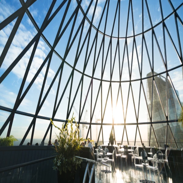 Abstract glass building with a view of the sky