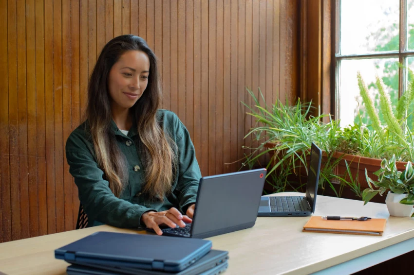 Woman looking at laptop