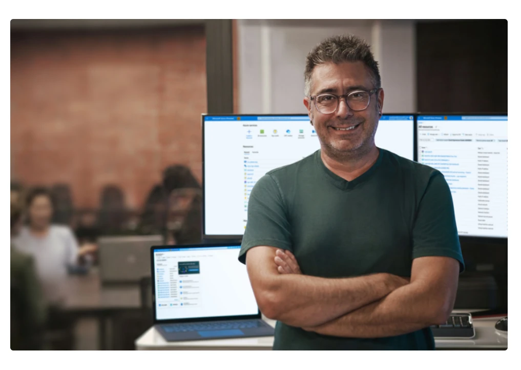 Man standing in front of computer