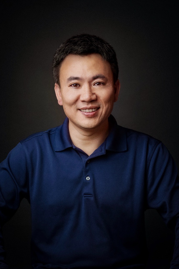A man in a blue shirt
