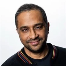A man smiling for a picture