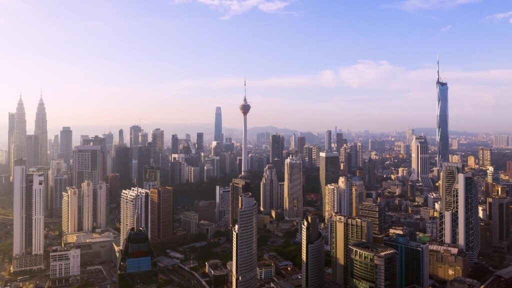 Skyline view of a modern city with tall buildings.