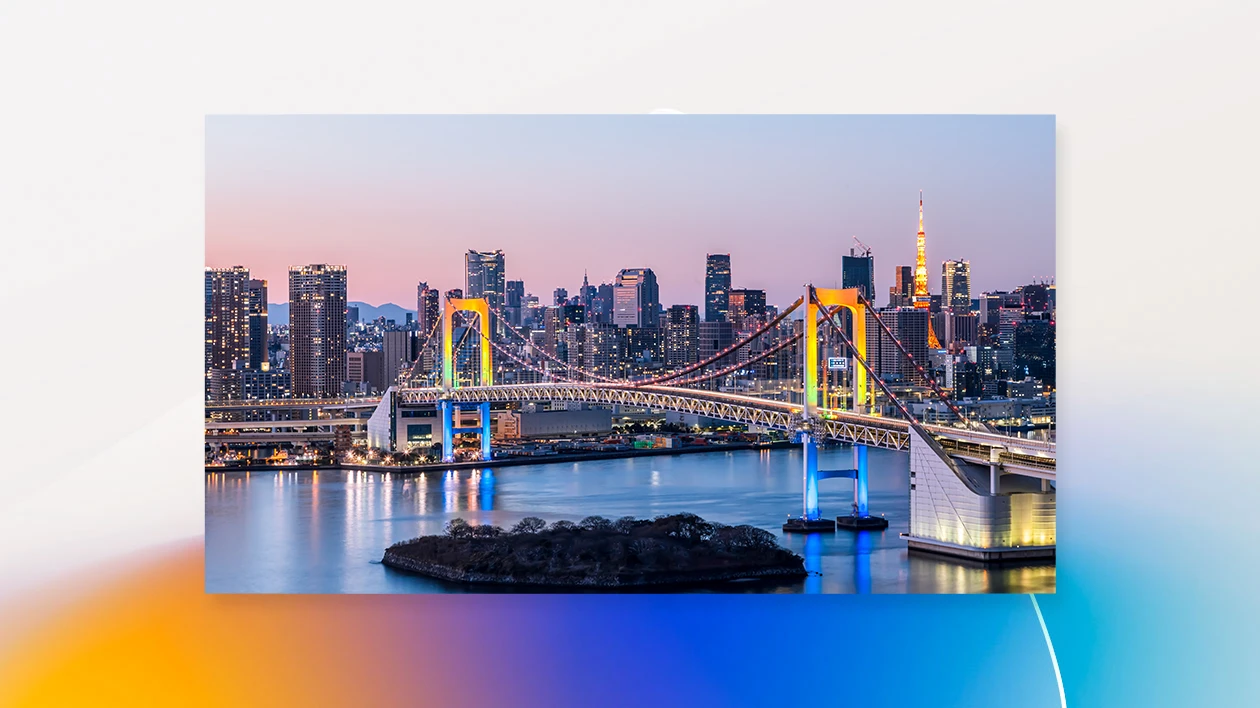 Sunset view of Tokyo Bay, with Rainbow bridge, skyscrapers, Tokyo Sky tree, office buildings, and apartment houses.