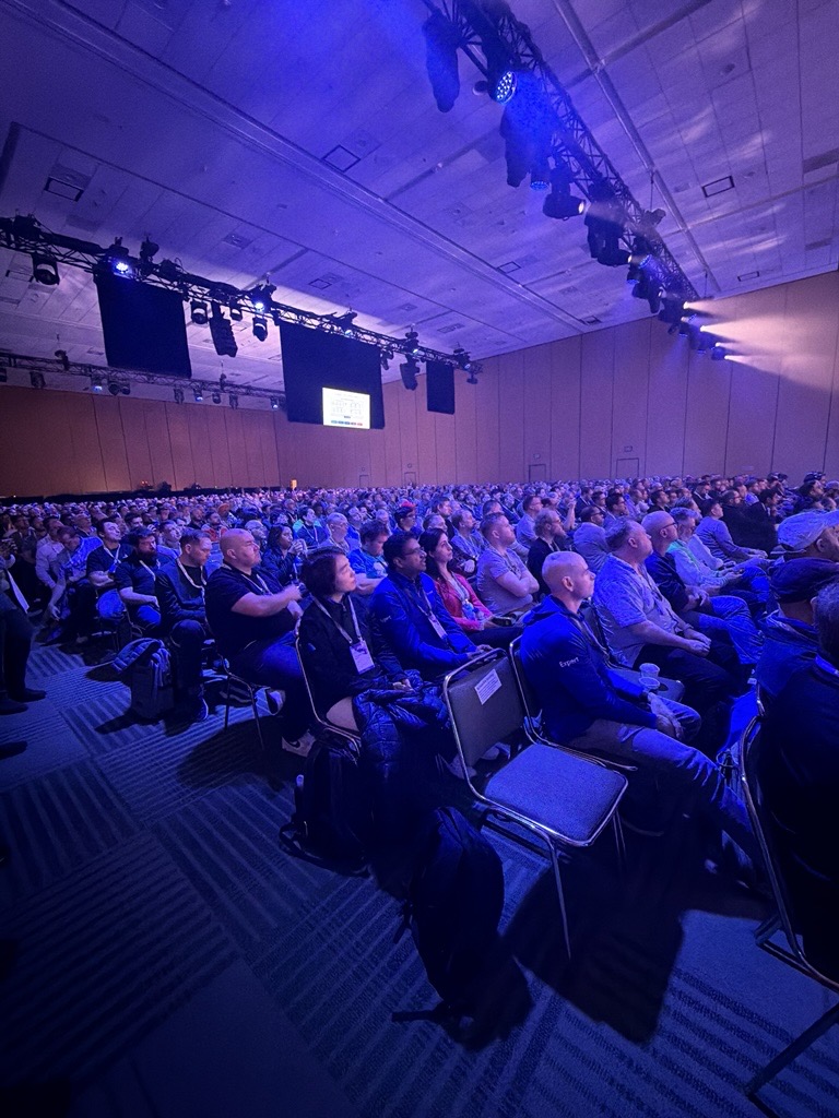 A group of people sitting in chairs.