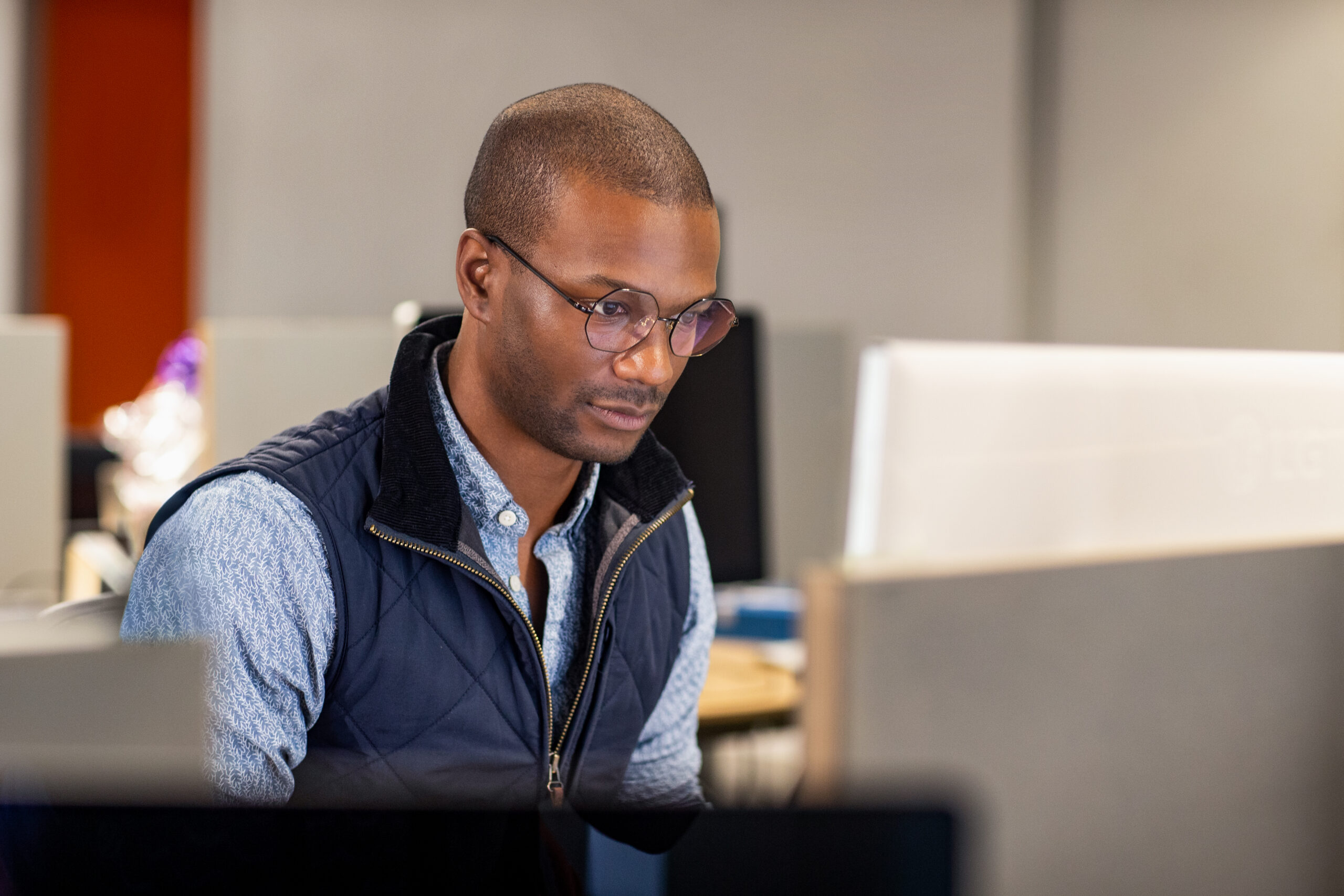 Person working at computer.
