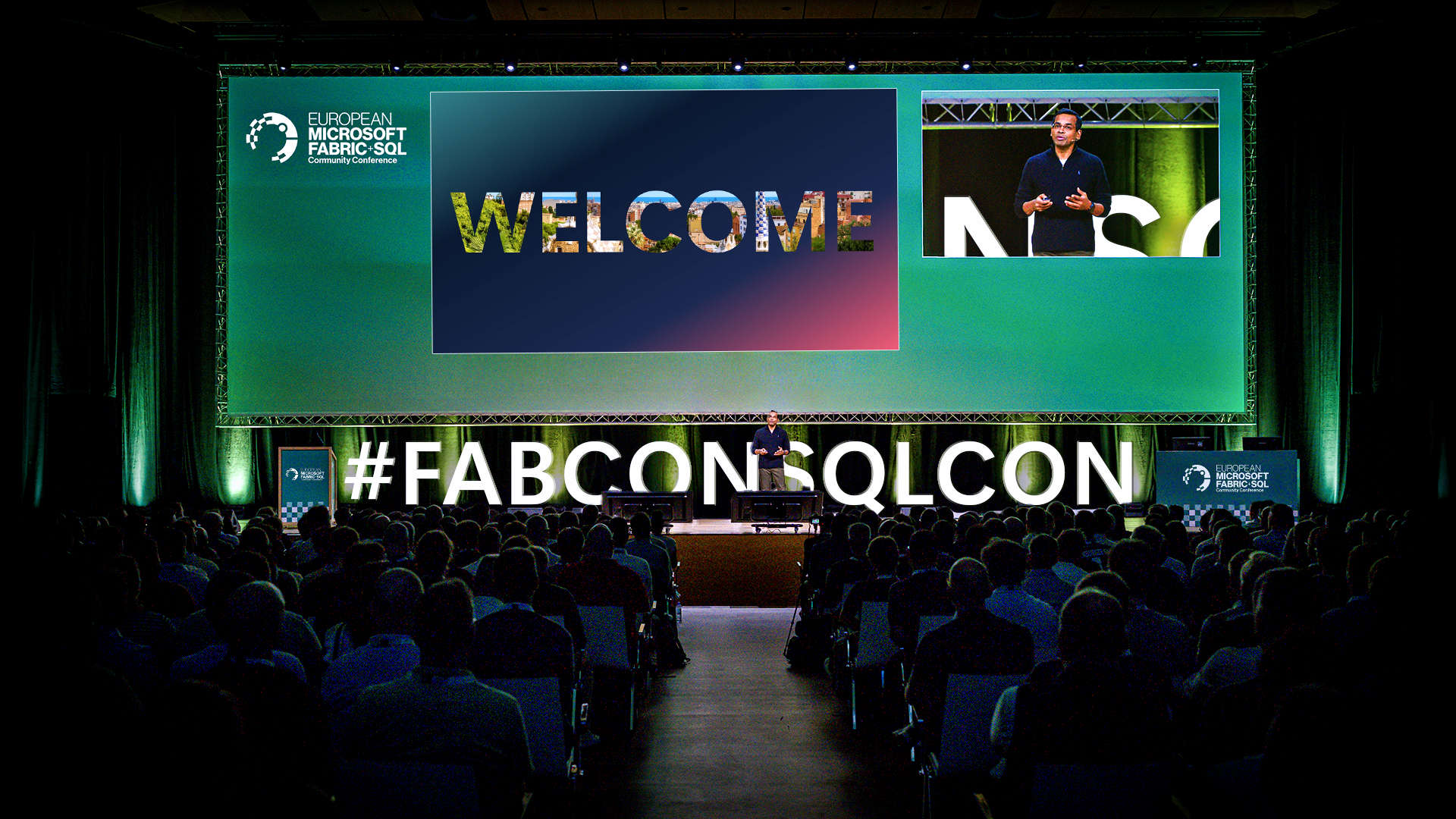 A conference room full of people during a keynote presentation
