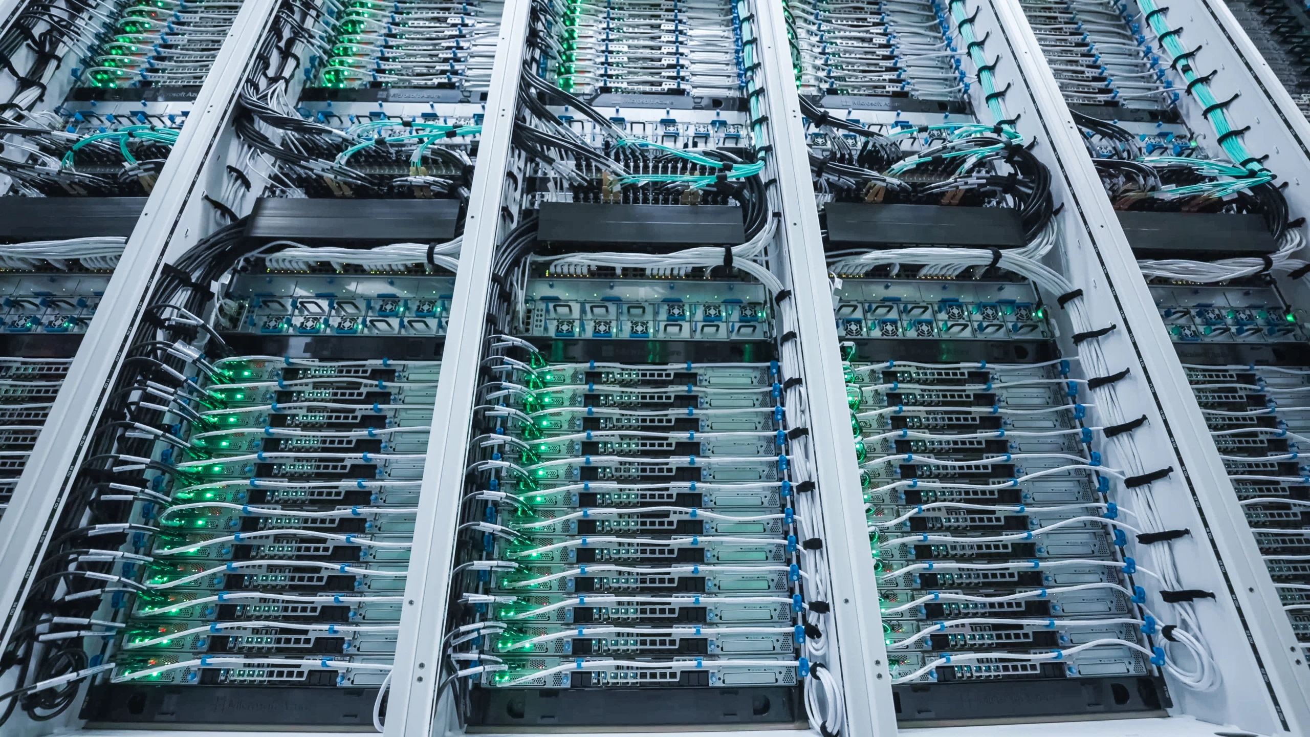 Rows of Azure Cobalt 200 server systems installed in a Microsoft datacenter.