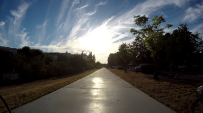 Video of a path outside while the sun shines brightly.